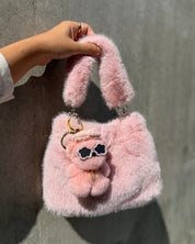 eco fur mini handle bag pink