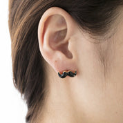 A PIERCED EARRINGMustache