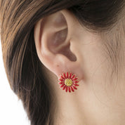 A PIERCED EARRINGMarguerite Red